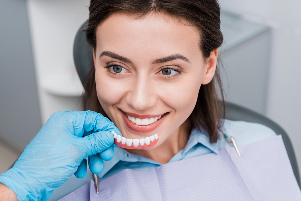 Cropped view of dentist